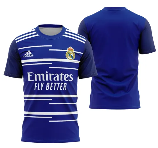 Foto da camisa com logo no peito e estampa grande nas costas exibindo design inspirado na visita do Real Madrid de 2022, combinando detalhes modernos e estilo esportivo marcante.