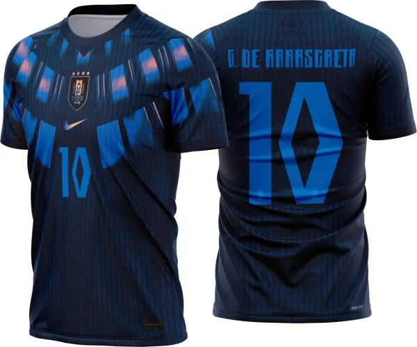 Camisa com logo no peito destacado e estampa grande nas costas, design moderno que representa a seleção uruguaia para o período 2026-28, cores e detalhes que realçam a tradição e a paixão pelo futebol.