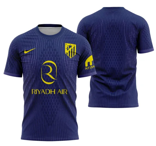 Camisa com logo no peito do Atlético de Madrid e estampa grande nas costas, exibindo design moderno da temporada 2025-2026 em cores vibrantes e detalhes marcantes para fãs do time.